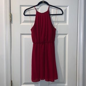 Red cocktail dress with open slit on the back